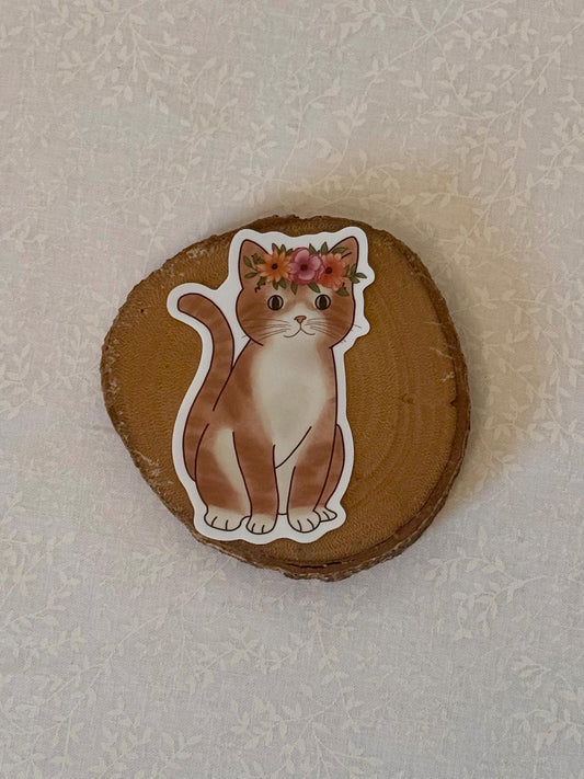 Orange tabby cat with flower crown | Sticker